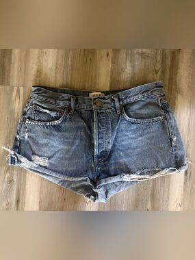Agolde light blue distressed denim cutoff shorts